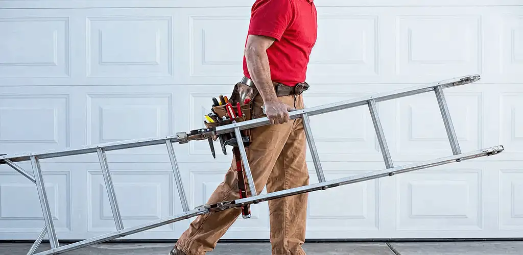 Garage door repair technician arriving with tools and ladder in Tampa, FL