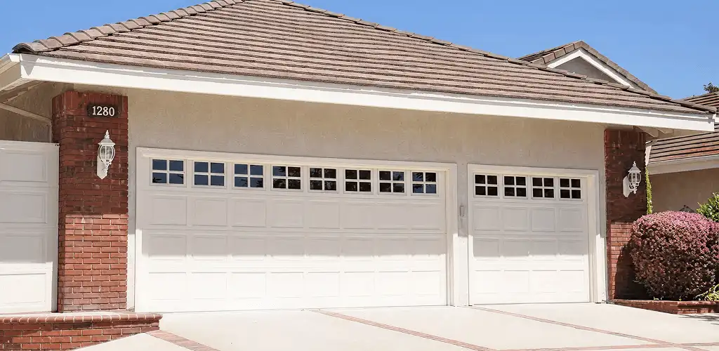 Residential garage door repair service for a double garage door in Tampa, FL
